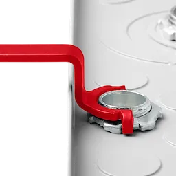 A red wrench from the 3 PC Locknut Wrench Set is being used to tighten a silver locknut on a white surface.