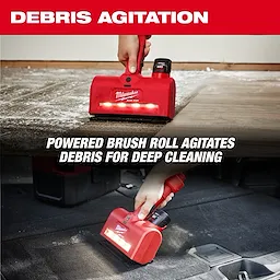 Two images of the M12™ AIR-TIP™ Utility Nozzle being used, with the label "DEBRIS AGITATION" at the top. The images demonstrate the powered brush roll agitating debris for deep cleaning on different surfaces.