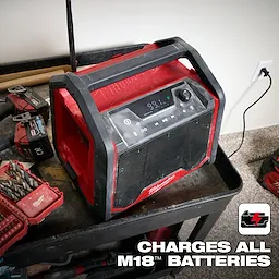 The M18 Bluetooth Jobsite Radio + Charger is a robust, red and black radio with a control panel and USB port. It charges M18 batteries.