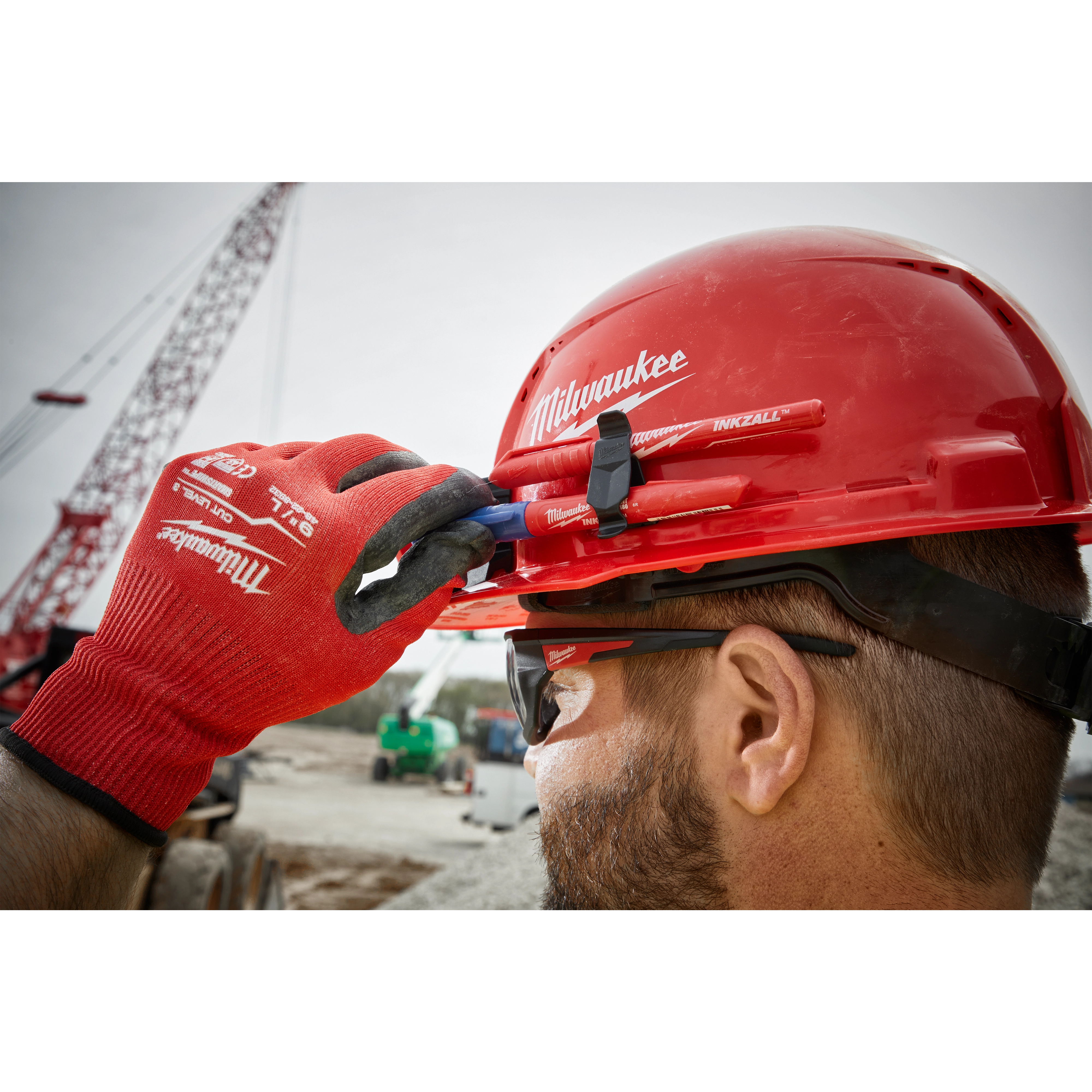 A red hard hat with a front brim and vented design, featuring a 4-point ratcheting suspension system. This is a Red Front Brim Vented Hard Hat w/4pt Ratcheting Suspension - Type 1, Class C.