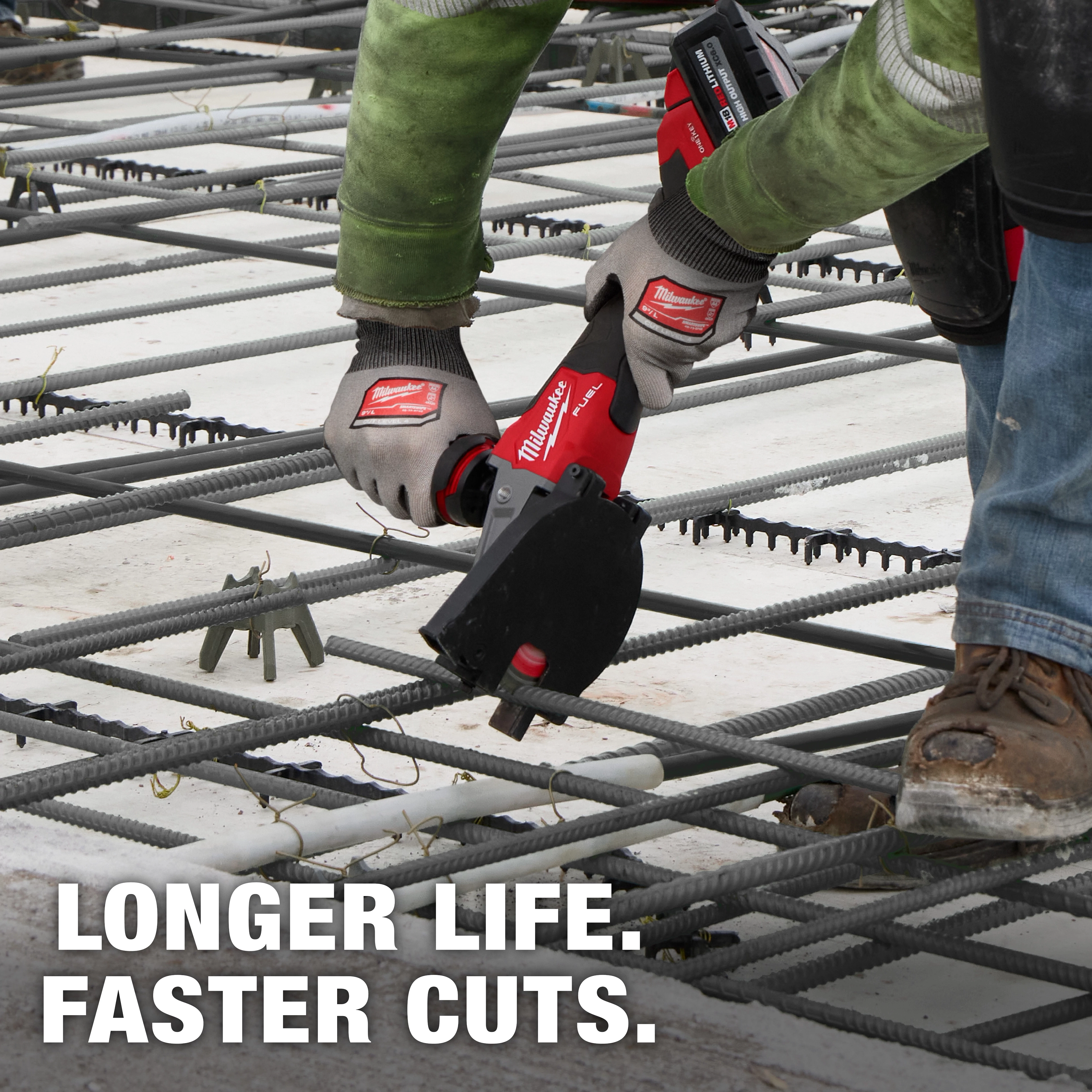 A construction worker uses a Milwaukee power tool equipped with a #10 (1-1/4”) Rebar Cutting Blade to cut through rebar on a job site. The text "LONGER LIFE. FASTER CUTS." appears at the bottom of the image.