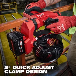 M18 Brushless Scissor Lift Fan with 2" quick adjust clamp design, shown being operated by a person wearing red gloves.