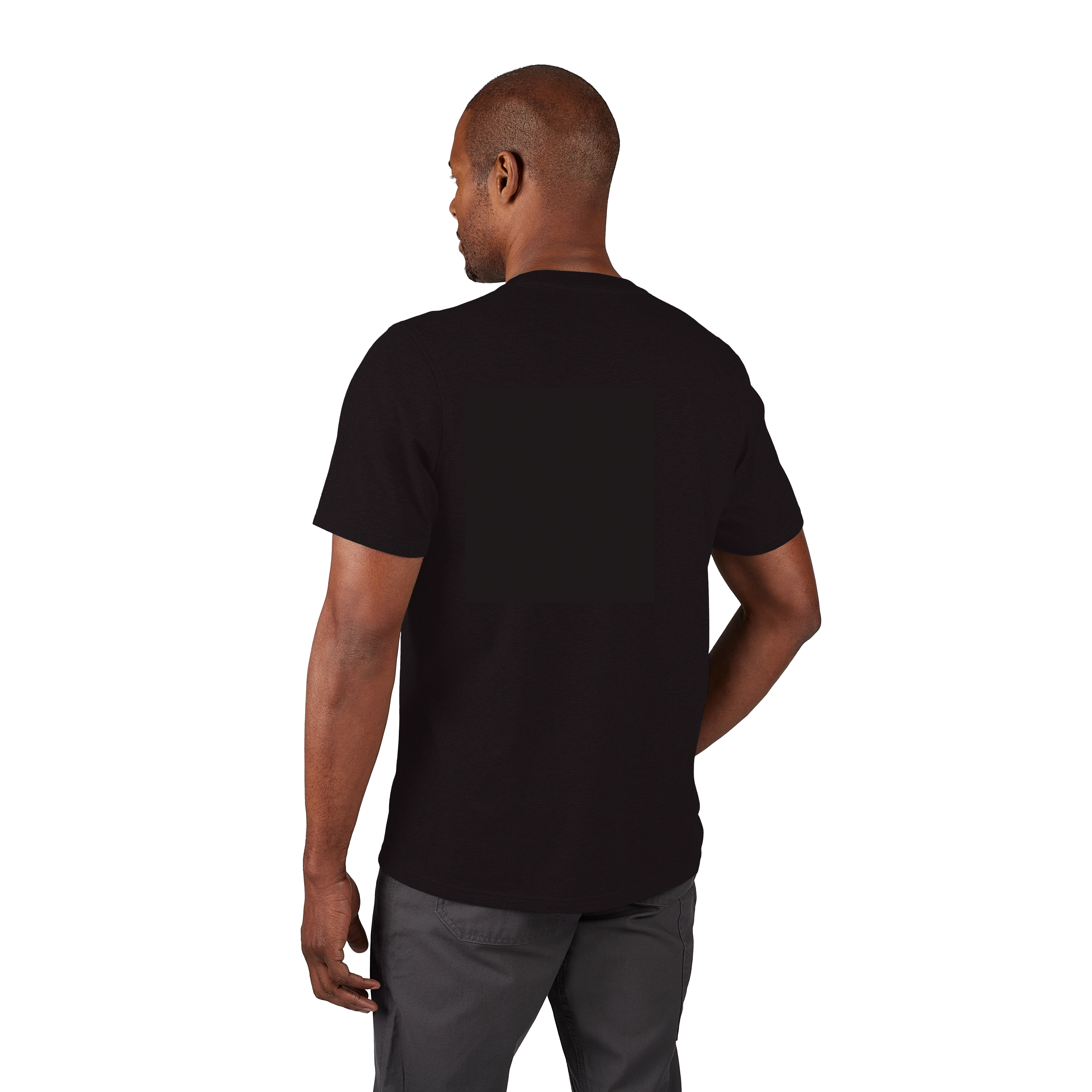 A man wearing the Hybrid Work Tee in black, viewed from the back. The tee has short sleeves and is paired with gray pants.