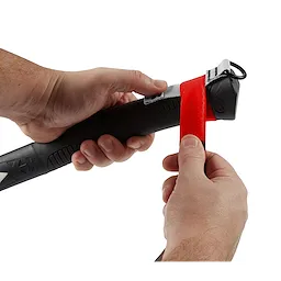 Hands applying 12ft Self-Adhering Tape to a black handle, wrapping the red tape around it securely for grip enhancement.