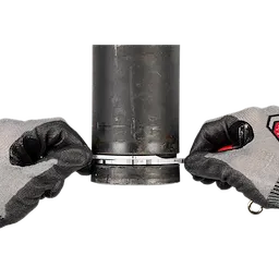 A person wearing gray and black work gloves is holding a black cylindrical pipe, fastening a silver adjustable clamp around its base. The image focuses on the hands, gloves, and the clamp against a white background.