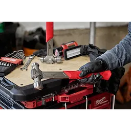 Worker holding the 24oz Steel Ball Peen Hammer