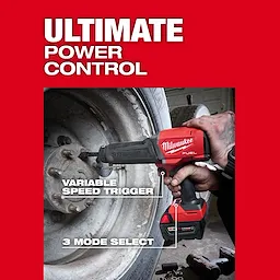 M18 FUEL STRIKER Hammer Chisel loosening lug nuts on a vehicle wheel in a workshop setting