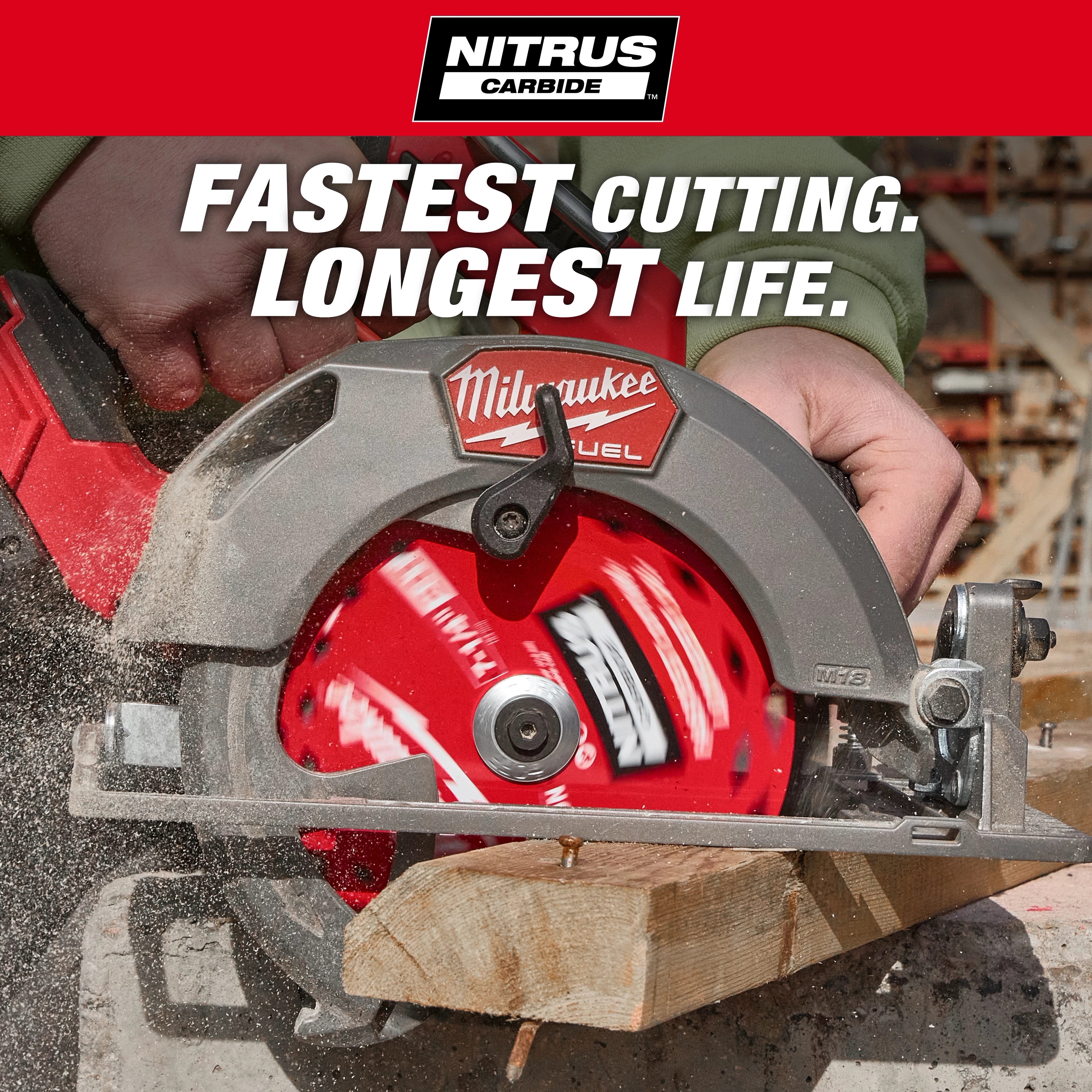 The 7-1/4” 24T NITRUS™ Carbide Framing & Demolition Circular Saw Blade is shown cutting through wood. The red blade is attached to a circular saw in use, emphasizing its fast cutting and long life capabilities.