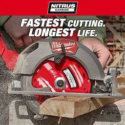 The 7-1/4” 24T NITRUS™ Carbide Framing & Demolition Circular Saw Blade is shown cutting through wood. The red blade is attached to a circular saw in use, emphasizing its fast cutting and long life capabilities.