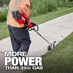 A person wearing work gloves and an orange safety vest uses an M18 FUEL™ Edger to trim the edge of a sidewalk. The text reads, "More Power Than 31cc Gas."