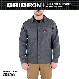 Person wearing a gray GRIDIRON Flannel Shirt with button front and chest pockets against a white background.