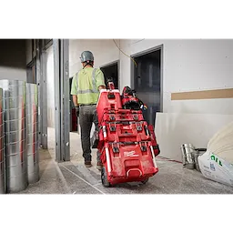 The PACKOUT™ 25oz Bottle with Chug Lid is a robust, stainless steel water bottle designed for durability and convenience. It features a large chug lid for easy drinking and a sturdy handle for carrying. The red-colored body has a textured grip for a secure hold. The lid is black with a flip-top chug spout and a locking mechanism to prevent leaks. This bottle is ideal for keeping beverages cold or hot during work or travel.