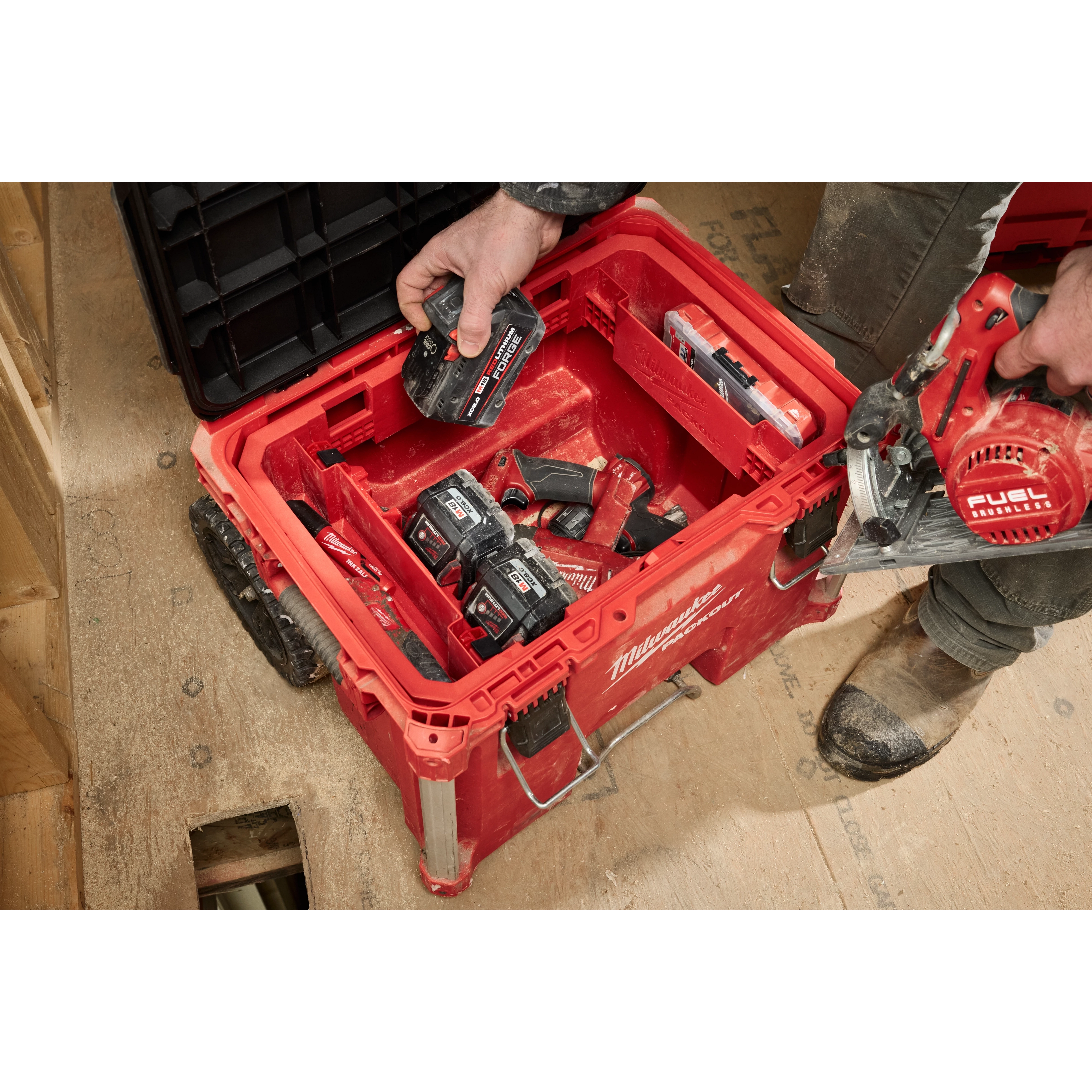 Tool Box Attachment Ready Tray for PACKOUT Tool Boxes loaded with various tools and accessories, with a person removing a tool.