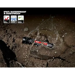 USB Rechargeable 800L Compact Flashlight in muddy water showing its durability features: waterproof, dustproof, and impact-resistant.