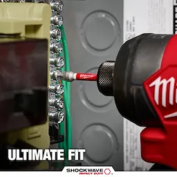 A Milwaukee power tool is shown using a red SHOCKWAVE™ Square Bit to screw into a panel of connectors. Text on the image reads "Ultimate Fit." The SHOCKWAVE Impact Duty logo is displayed at the bottom.