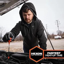 Person wearing the M12™ Heated Hoodie works under the hood of a car. The hoodie uses Hexon Heat Technology, which has the fastest heat-up time.