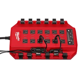 The image shows a red Power Manager – 15 Amp Circuit by Milwaukee, featuring multiple AC outlets, integrated cord management, and indicator lights on the right. It is designed for efficient power distribution and organization.