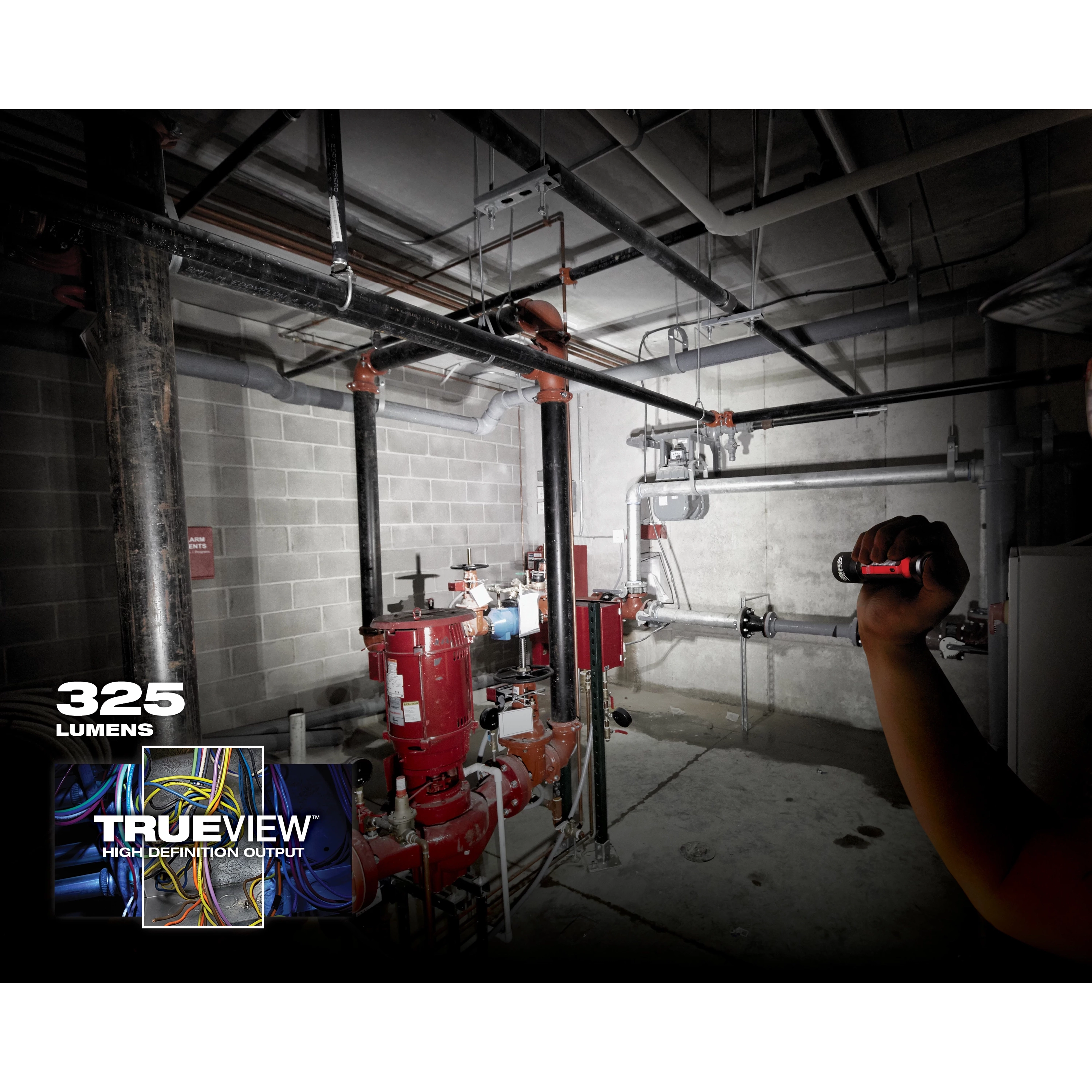 Person using a flashlight in a dimly lit industrial setting, illuminating pipes and machinery. Overlay text: "App%20Shot%20with%20overlay," "325 lumens," "TRUEVIEW High Definition Output."