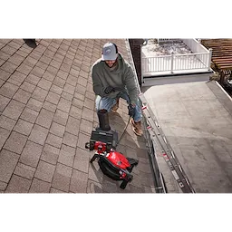 Image of a Milwaukee M12™ 85’ High Flex Compact Inspection Camera Kit being used by a worker on a jobsite