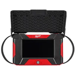 The image shows an M12™ Wireless Monitor. It has a black screen with a red and black protective casing. A textured black cover, featuring a honeycomb pattern, is partially opened above the screen. The Milwaukee logo is visible above the screen.