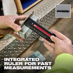 Hands using the Milwaukee Rechargeable Flat Flashlight w/ Green Laser to measure metal with its integrated ruler.