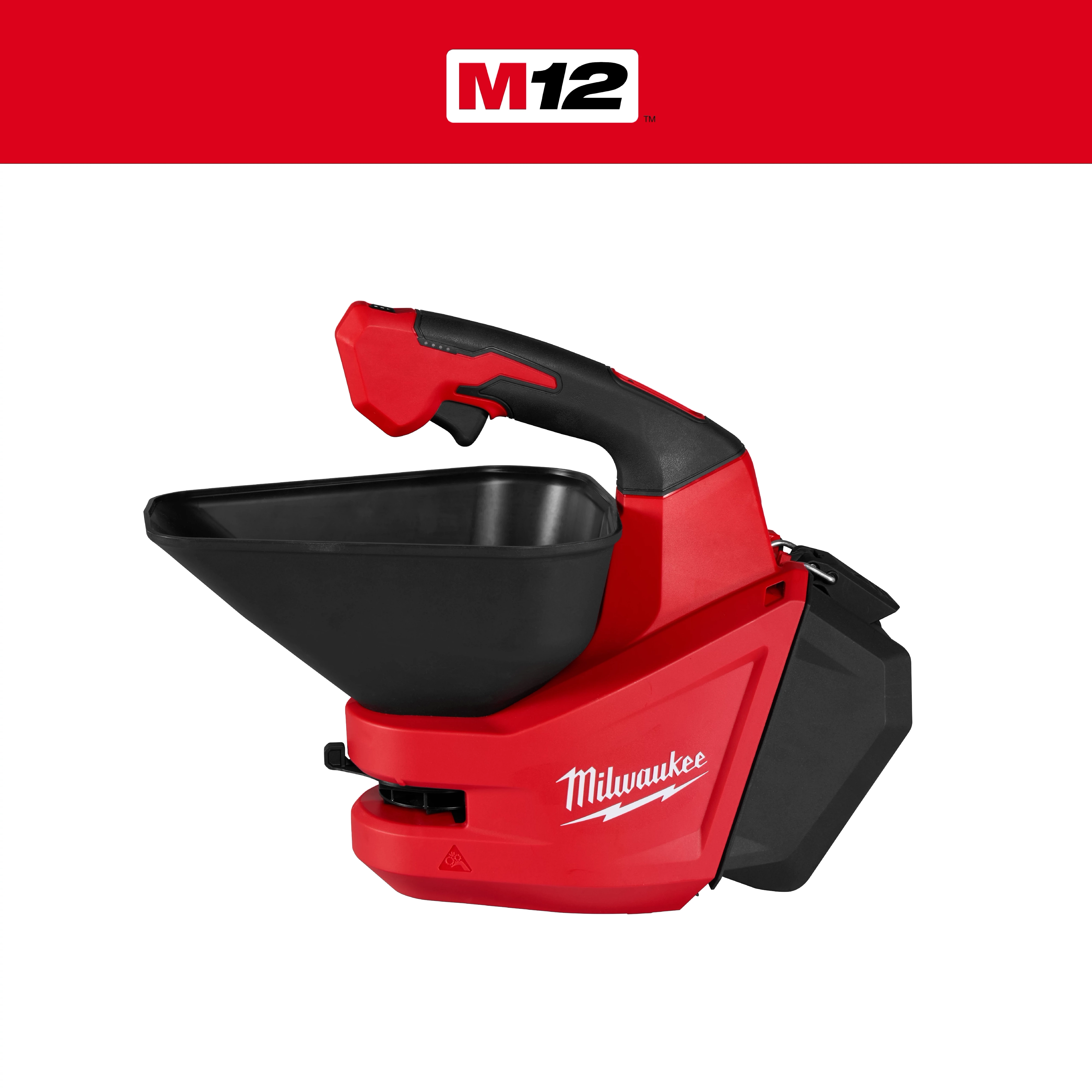Red and black M12 Handheld Broadcast Spreader with a top hopper and side handle on a plain background.