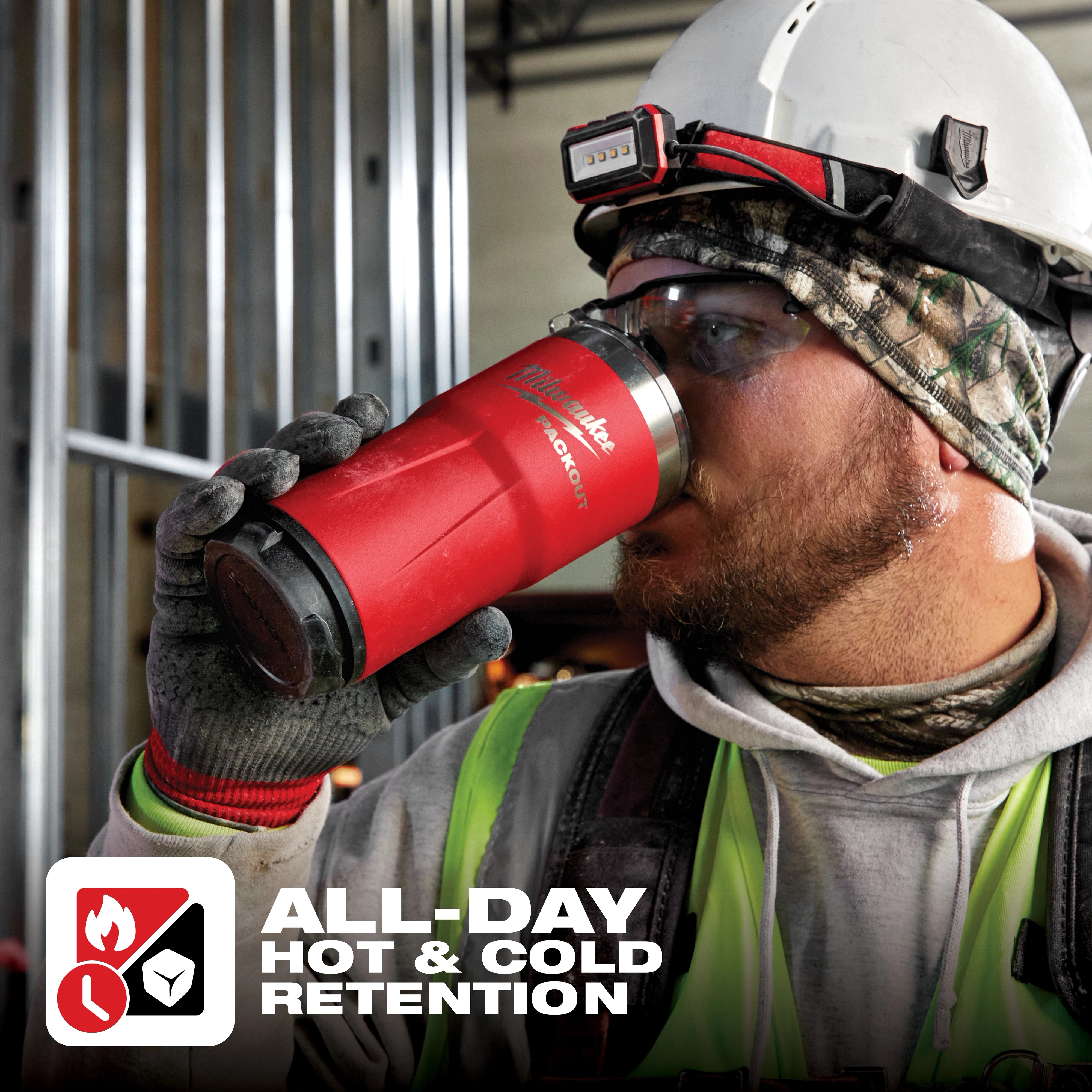 A construction worker holding a red PACKOUT 20oz Tumbler. Text reading "All-Day Hot & Cold Retention" is displayed at the bottom.